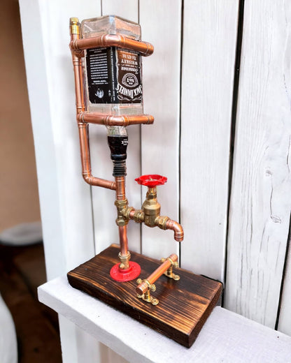 Copper Drinks Dispenser "The Wagon Wheel" With Bottle Surround.